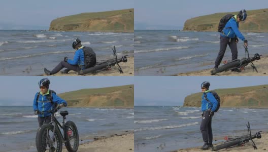 Fat bike也叫fatbike或fattire bike在夏天在海滩上驾驶。高清在线视频素材下载