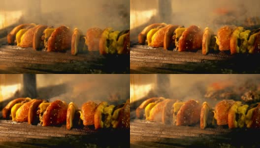 在炙热的烤架上手工烹饪汉堡高清在线视频素材下载