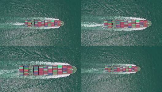 集装箱船，国际物流业务货运海运由集装箱船在公海，空中俯瞰。高清在线视频素材下载