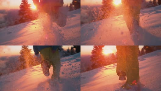 低角度:夕阳下，人们在白雪覆盖的草地上奔跑，雪花闪闪发光。高清在线视频素材下载