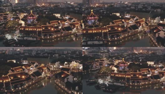 夜间，中国苏州运河镇的无人机拍摄。高清在线视频素材下载