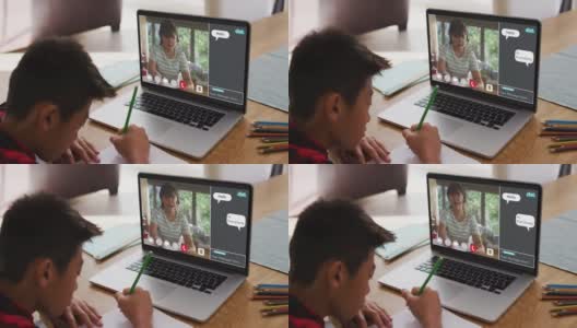 亚洲男孩在家里用笔记本电脑做作业，和女老师视频通话高清在线视频素材下载