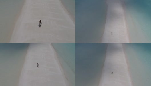 在马尔代夫的沙洲上散步高清在线视频素材下载