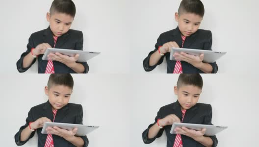 小男孩用平板电脑高清在线视频素材下载