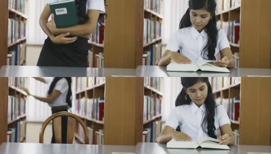 女人在图书馆看书高清在线视频素材下载