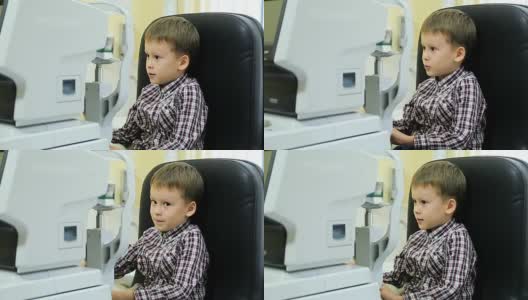 小男孩在现代眼科诊所检查视力。高清在线视频素材下载
