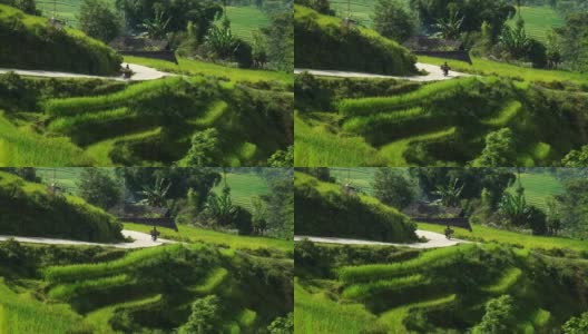 在亚洲越南萨帕骑摩托车穿过风景优美的梯田高清在线视频素材下载