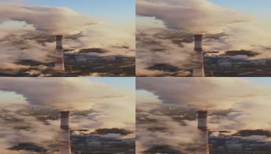 工业工厂在空气中排放气体，垂直录像。高清在线视频素材下载