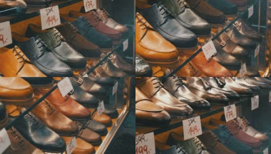 鞋店橱窗里的货架上摆放着各种颜色的经典皮革男鞋，上面贴着打折的价签高清在线视频素材下载
