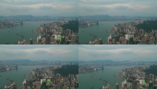 日落黄昏香港市景湾仔区维多利亚港码头航拍全景4k高清在线视频素材下载