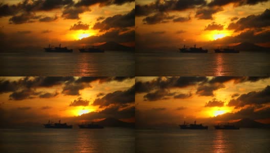 中国海南三亚，渔船在海上的夕阳灯光高清在线视频素材下载