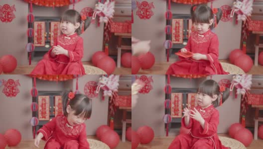 蹒跚学步的小女孩穿着传统服装庆祝中国新年高清在线视频素材下载