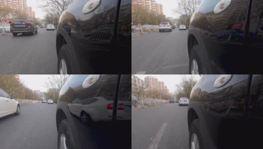 在污染的日子里，在北京城市的道路上行驶的汽车的侧面字体视图高清在线视频素材下载