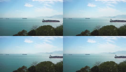 跨越蓝绿色海洋的集装箱货船高清在线视频素材下载