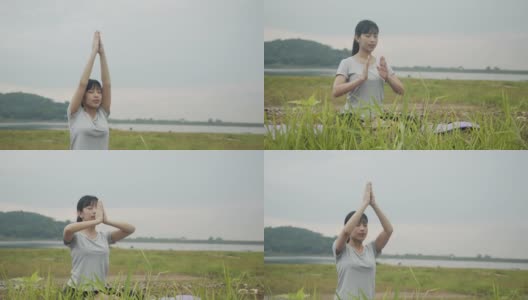 运动亚洲女性坐在冥想姿势姿势医学瑜伽调呼吸平衡在美丽的山景在日出。高清在线视频素材下载