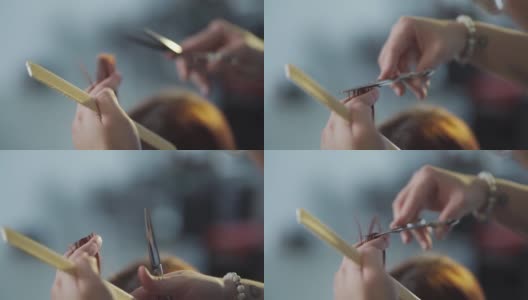 慢镜头亚洲华人发型师在美发沙龙为她的顾客理发高清在线视频素材下载
