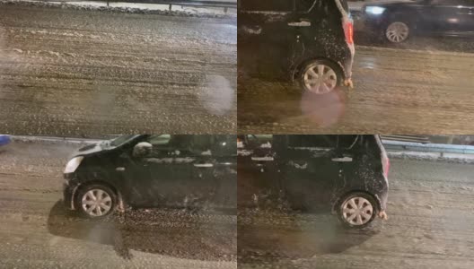 潮湿的道路，特写镜头，汽车行驶在夜晚的冬季街道上。雪和雨。在恶劣天气，车辆行驶在潮湿、多雨、湿滑的道路上高清在线视频素材下载