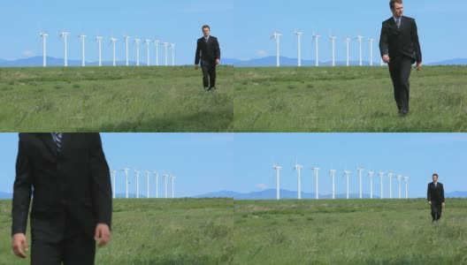 商人带着风力涡轮机走路高清在线视频素材下载