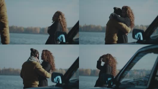 秋日，一对恋人在湖边拥吻高清在线视频素材下载