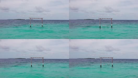 在马尔代夫的海洋，海浪和全景的平衡架镜头高清在线视频素材下载
