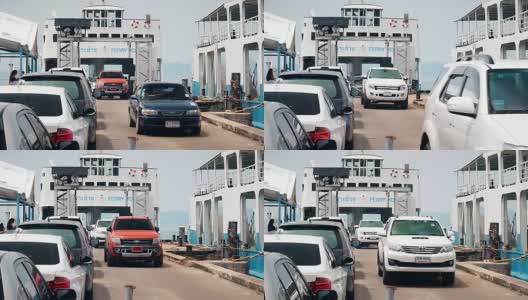 在Koh Chang，成排的汽车从渡船上下来高清在线视频素材下载