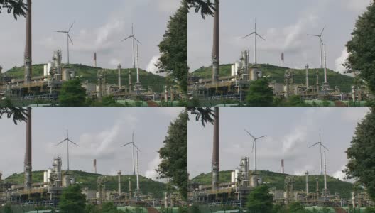 炼油厂和风力涡轮机高清在线视频素材下载
