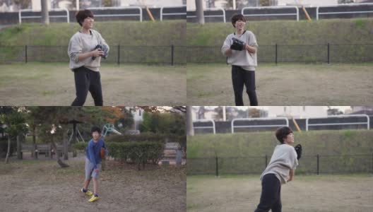 母亲在公园里和儿子玩接球- 2的第一部分高清在线视频素材下载