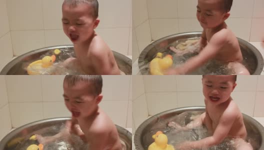快乐的宝宝疯狂地玩水高清在线视频素材下载