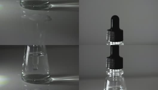 使用实验室移液器，背景是模糊的瓶子高清在线视频素材下载