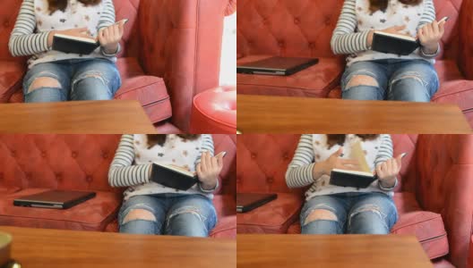 年轻女子在休息时间看书高清在线视频素材下载