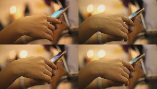 女人在机场使用智能手机的特写高清在线视频素材下载