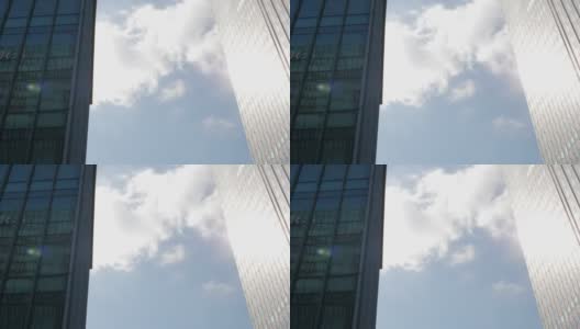 现代建筑反射阳光的玻璃墙高清在线视频素材下载