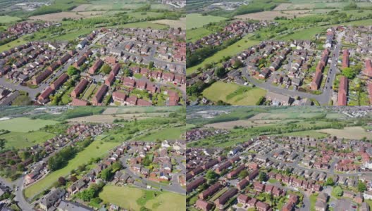 从空中拍摄的西约克郡韦克菲尔德奥塞特村中心的镜头，可以看到一个阳光明媚的夏天，从上方俯瞰英国的住宅、道路和街道高清在线视频素材下载