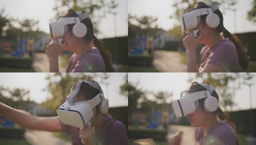 年轻女子戴着虚拟现实眼镜和拳击手套训练高清在线视频素材下载