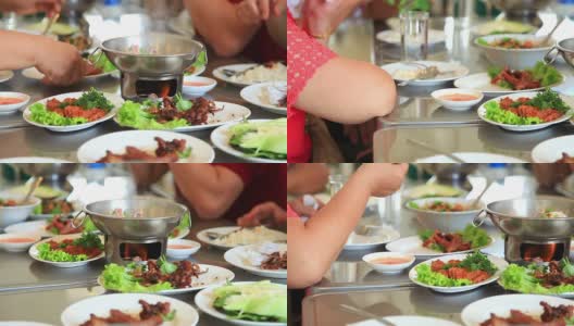 人们在餐馆吃泰国菜高清在线视频素材下载