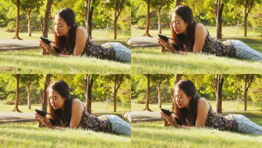 一名亚洲女性使用带触控笔的智能手机高清在线视频素材下载