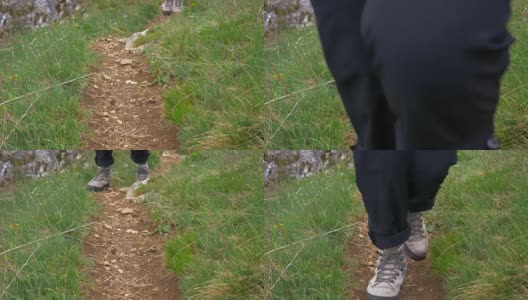 在山间徒步旅行的单身女子高清在线视频素材下载