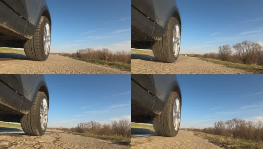 一辆乘用车的轮子在路上行驶高清在线视频素材下载