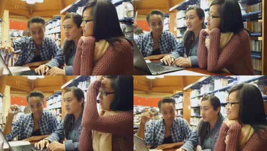 多民族朋友在大学图书馆进行头脑风暴和学习高清在线视频素材下载
