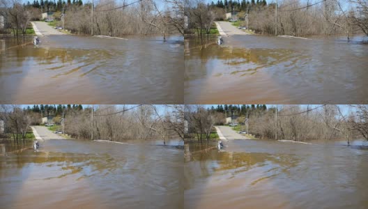 洪水流过被淹没的道路高清在线视频素材下载
