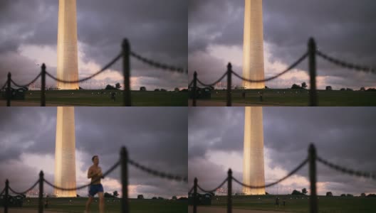 日落时分华盛顿纪念碑旁的跑步者高清在线视频素材下载