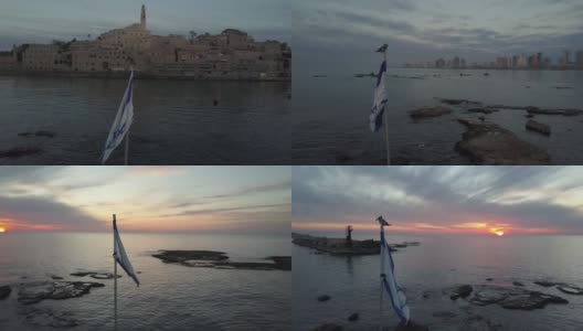 塞里尔·鲁迪斯·伯德站在以色列国旗上，与特拉维夫的雅法景观，高清在线视频素材下载