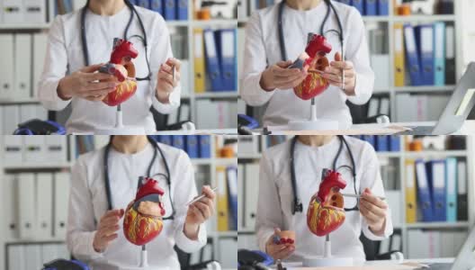 心脏医生在人工模型特写4k电影上展示心脏结构高清在线视频素材下载
