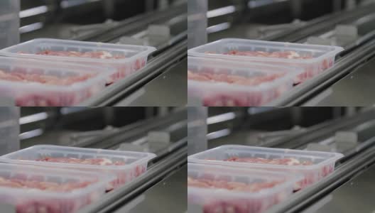 在工厂的生产线上包装肉类高清在线视频素材下载