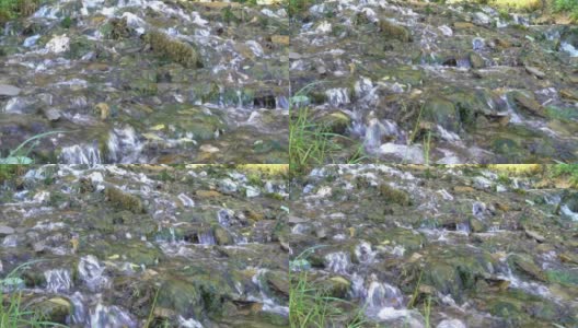 斯拉夫人泉位于俄罗斯普斯科夫地区的伊兹博斯克，风景如画，有12个地下纯净的斯拉夫人泉从岩石山上流下，另一个名字是12个圣使徒高清在线视频素材下载