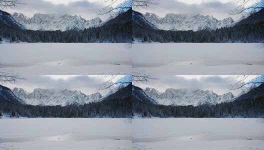 大雪覆盖着大山下面的山谷高清在线视频素材下载
