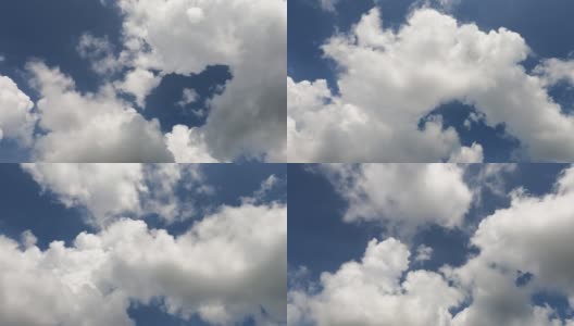 快速移动的蓬松的白云在阳光明媚的深蓝色天空上高清在线视频素材下载