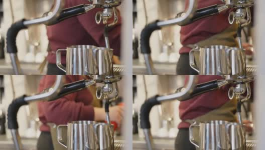 咖啡机在锐度区，咖啡师在这个过程中是模糊的。高清在线视频素材下载