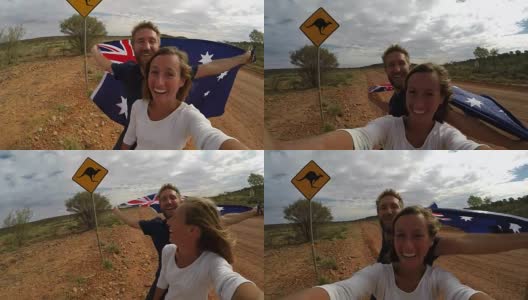 一对年轻夫妇与袋鼠标志自拍，澳大利亚高清在线视频素材下载