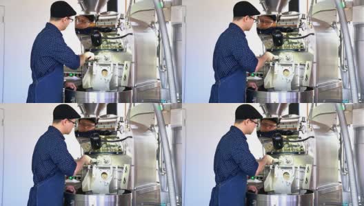 咖啡烘焙师在烘焙咖啡豆时检查咖啡豆高清在线视频素材下载